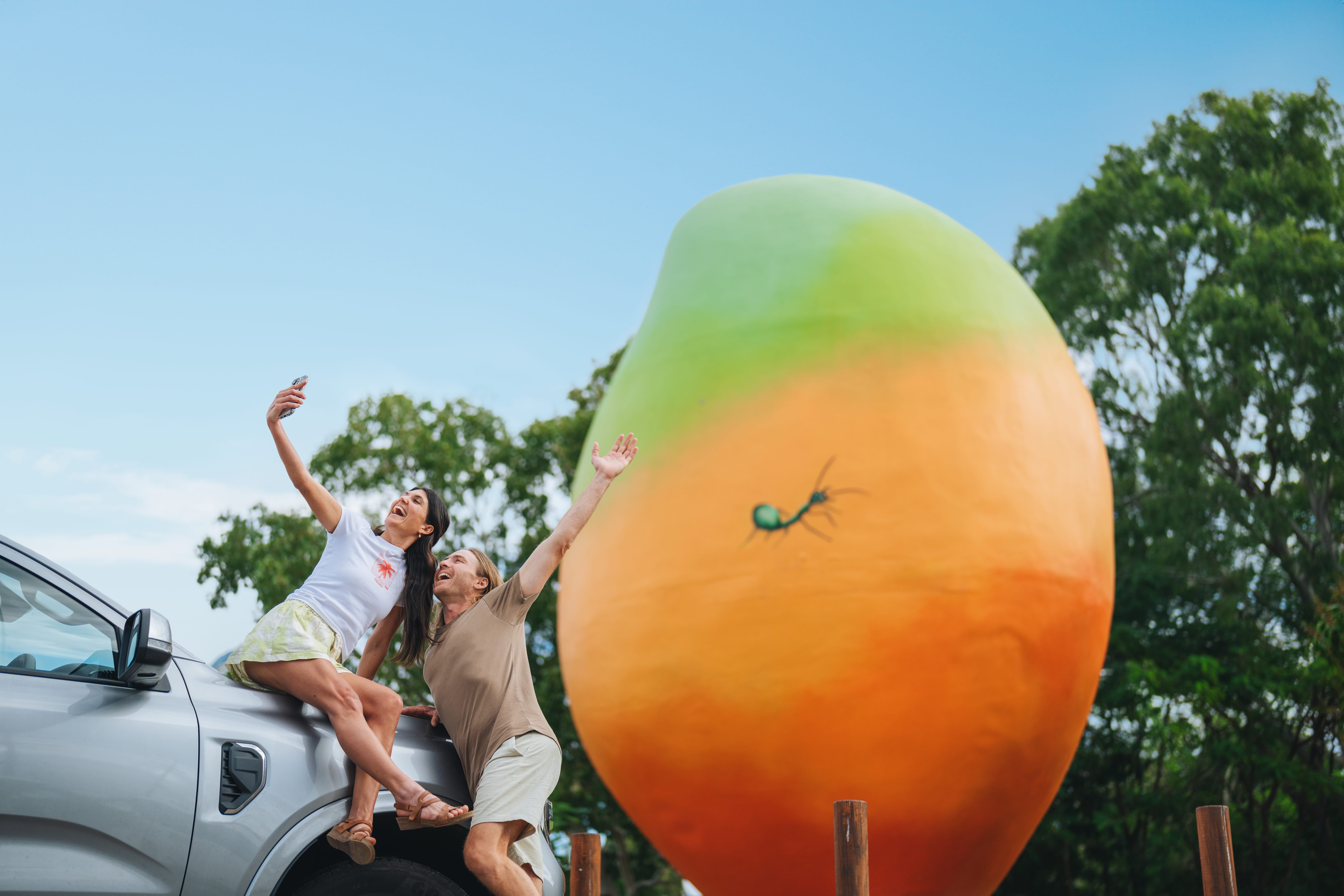Couple taking selfie at the roadside attraction